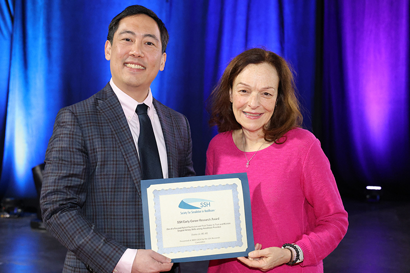 Dr. Charles Lin with Dr. Cathy Smith from the SSH Research Committee who announced the award.