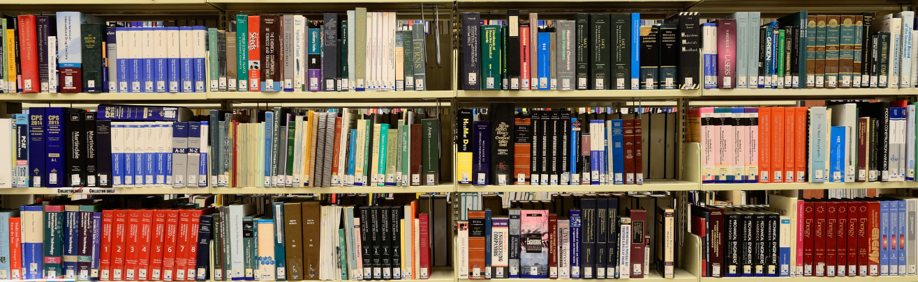 photo of library book shelves full of books