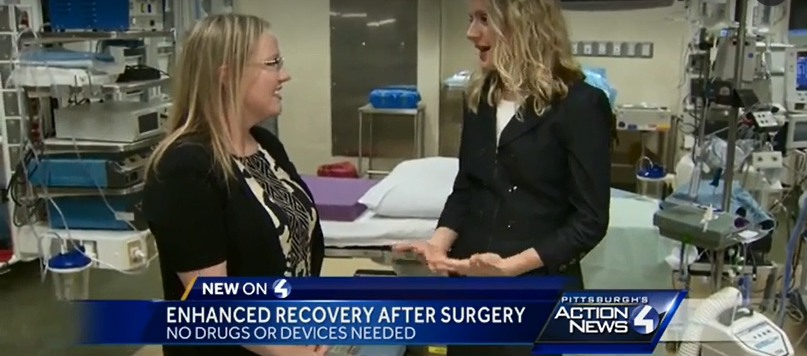 "A screenshot from Pittsburgh's WTAE news depicting two women talking in a hospital room surrounded by medical equipment"