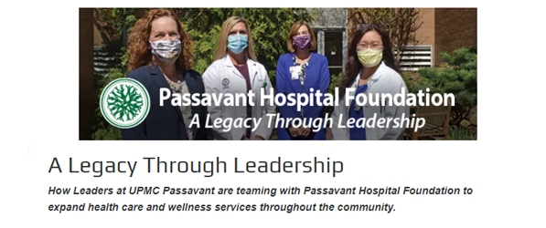 "Four medical professionals in masks standing outside with the logo for Passavant Hospital Foundation in front"