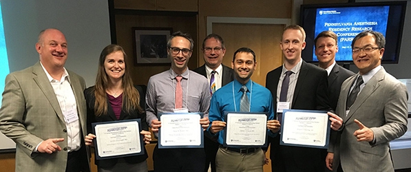 "Group of department residents posing with their awards"