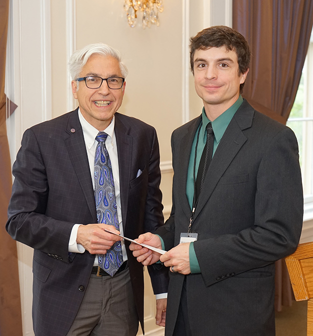 "Michael Chiang receiving an award"