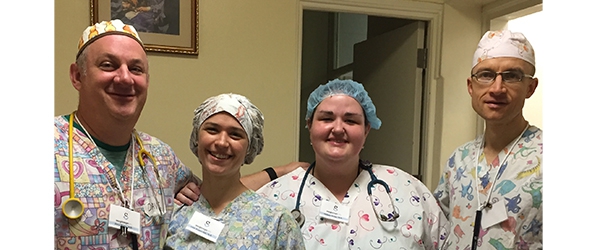 "Department members pose in their medical garb"