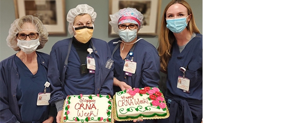 "Four CRNAs in masks pose with two cakes that read Happy CRNA Week"
