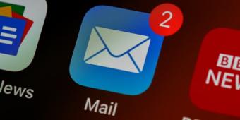 Apple Mail icon on an iPhone screen