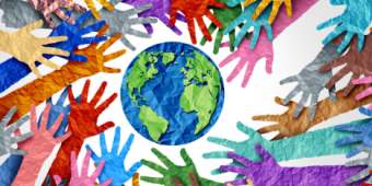 Graphic featuring many hands of different colors reaching for a green and blue globe