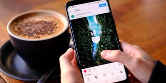 person using instagram on their phone