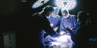 surgical team operating in an OR