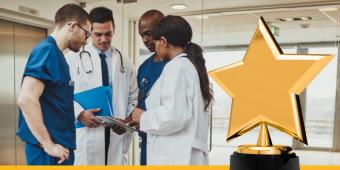 Graphic featuring four clinicians, two of them wearing white coats and the other two wearing blue scrubs, and a star-shaped trophy.