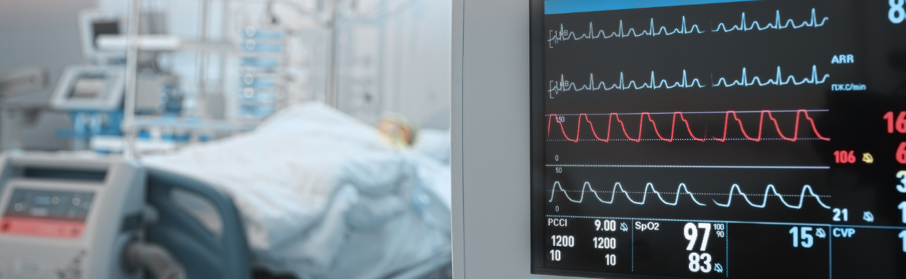 a photo of a patient room, with a focus on the vital signs monitor