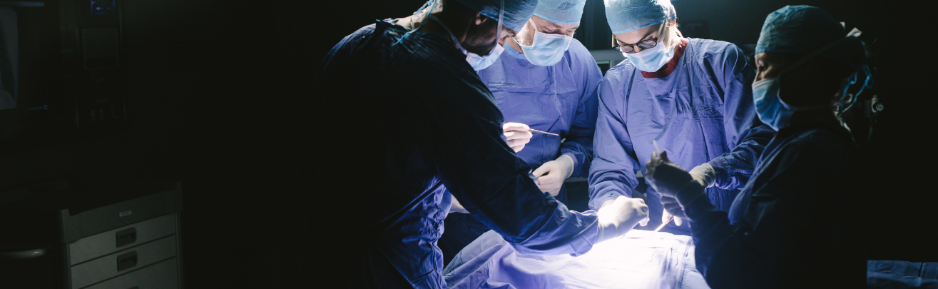 Surgery team performing a procedure in an operating room