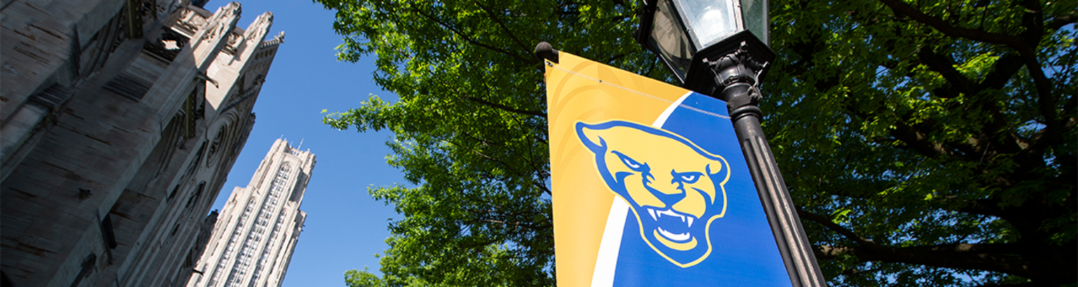 banner displaying the Pitt Panther symbol next to the Cathedral of Learning